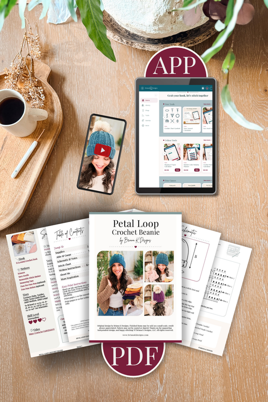 Pattern PDF pages fanned on a wood table with a phone video tutorial and a tablet showing the stitch app