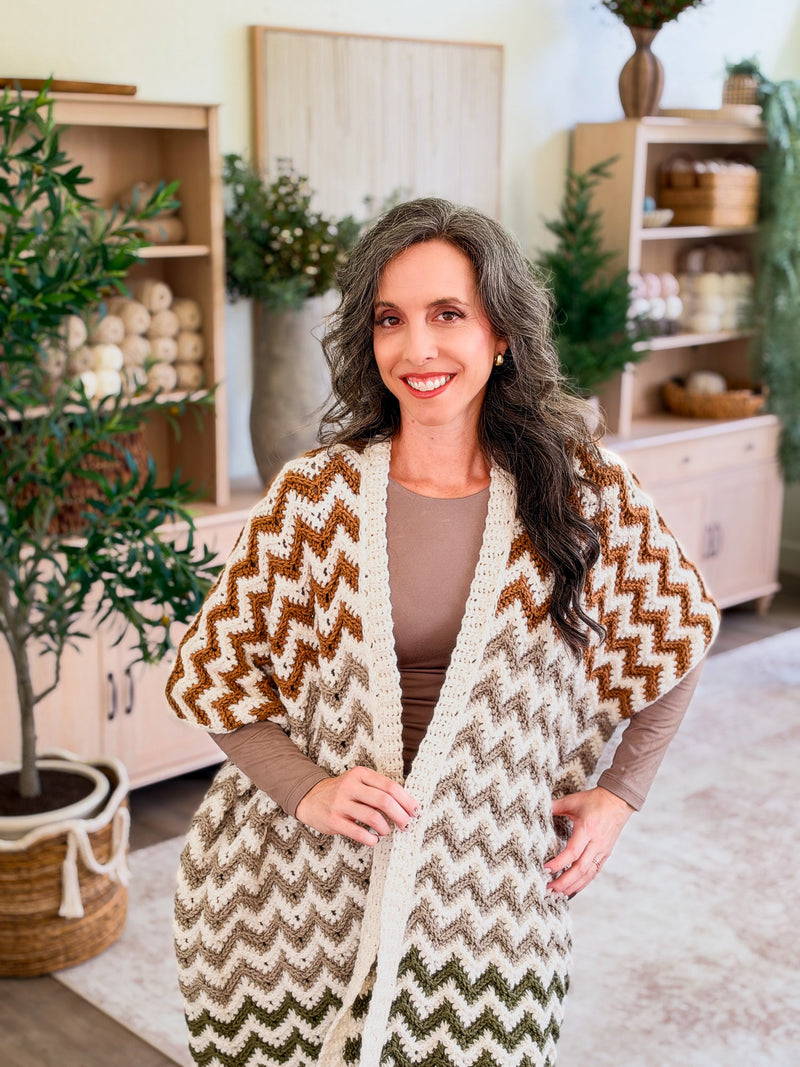Ripple Crochet Ruana pattern, a striped chevron crochet wrap in white, camel, sand, and green