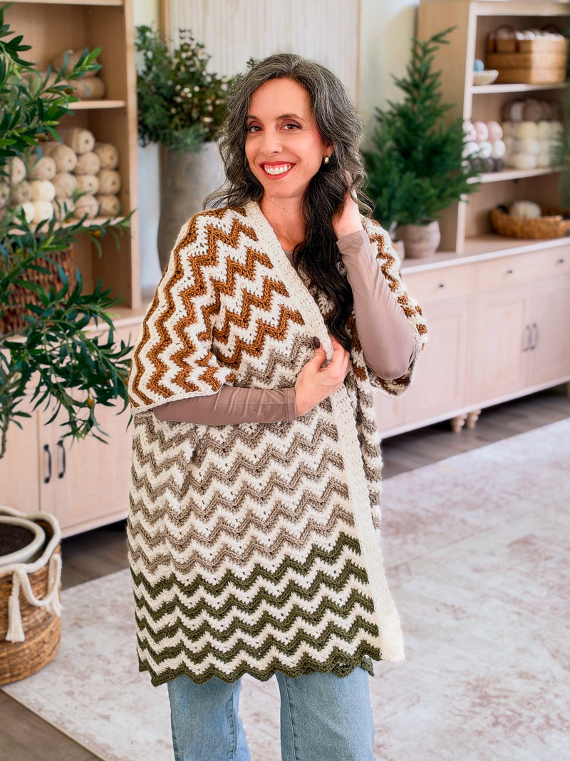 Ripple Crochet Ruana wrapped closed and worn with jeans