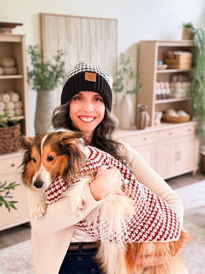 Briana and her dog in matching houndstooth crochet beanie and dog sweater