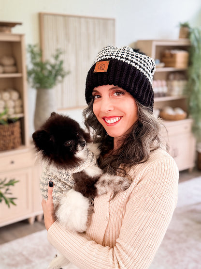 Briana and her dog in matching houndstooth crochet beanie and dog sweater