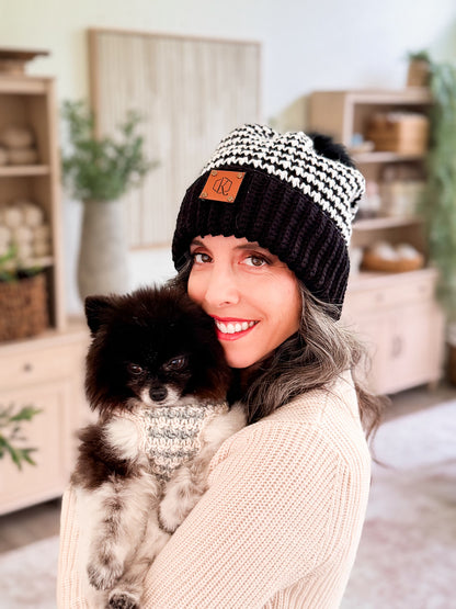 Briana and her dog in matching houndstooth crochet beanie and dog sweater