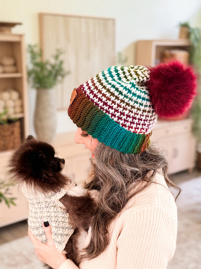 Briana and her dog in matching houndstooth crochet beanie and dog sweater