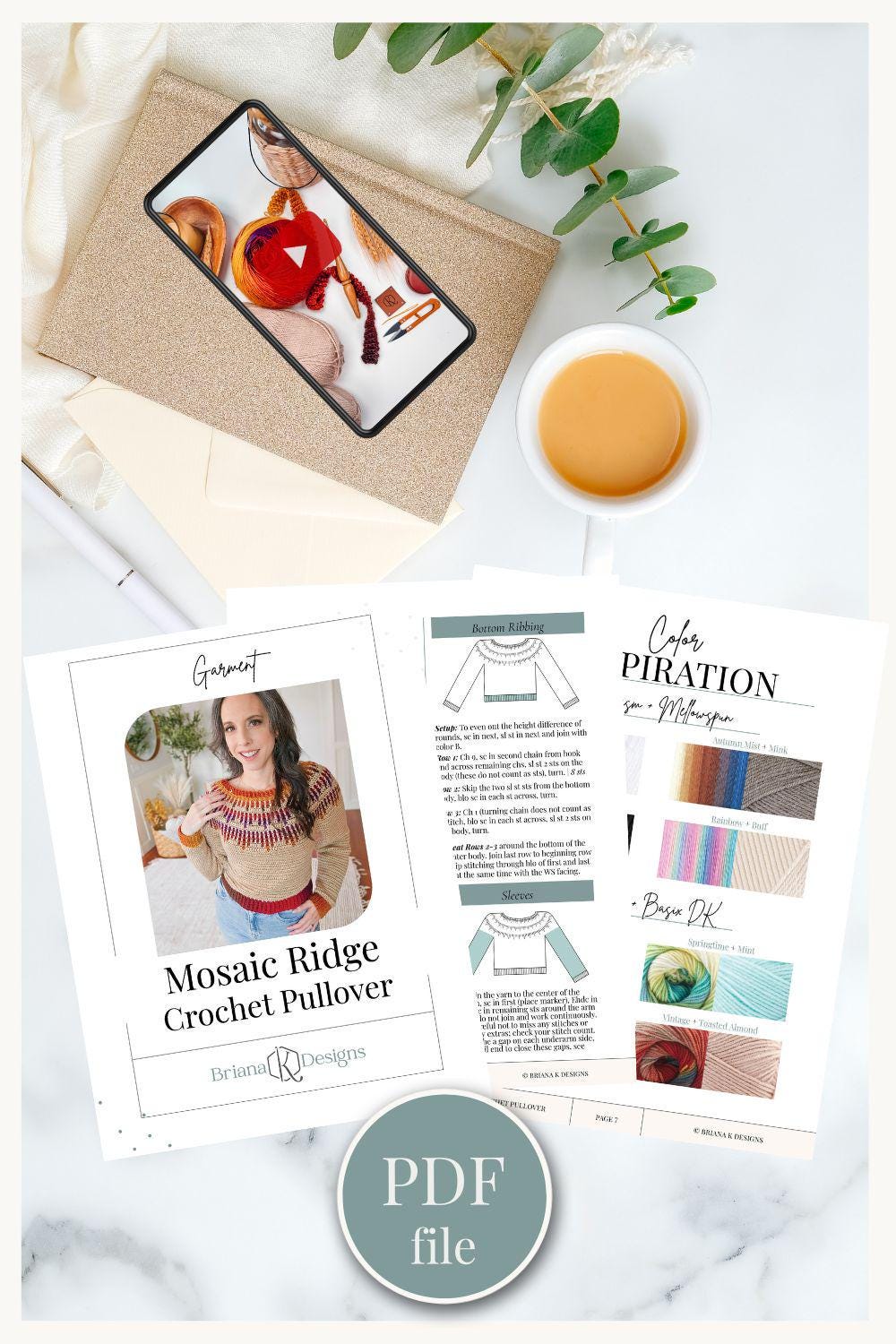 Flat lay showcasing a styled mockup with a crochet sweater pattern booklet, a cup of coffee, a smartphone displaying a leaf image, and an envelope on a light surface. This PDF file captures the charm of clothes in every stitch.