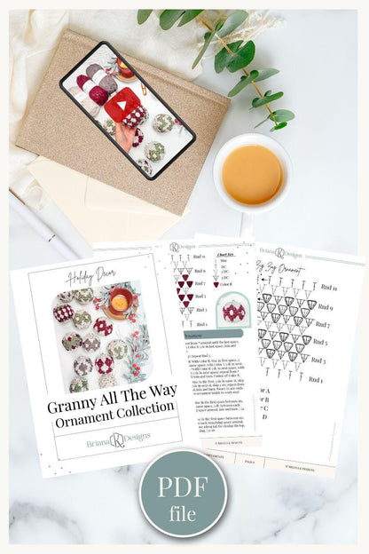 Granny All The Way Ornament Collection" is a charming crafting guide featuring photos of ornaments, crochet instructions, and even a cup of coffee beside a smartphone displaying designs. This guide includes a PDF file.