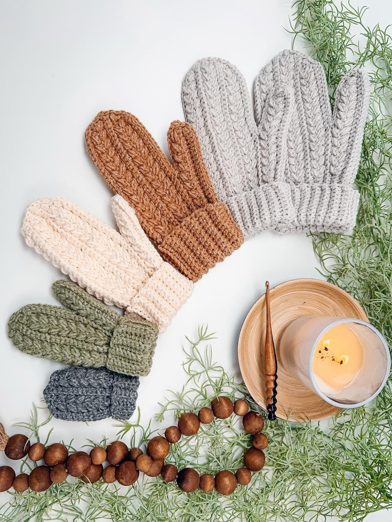 Winter Wheat Flat Mittens crochet pattern: crochet mittens in gray, sage, cream, rust and light gray, sized small to large, fanned out with a candle and wood beads