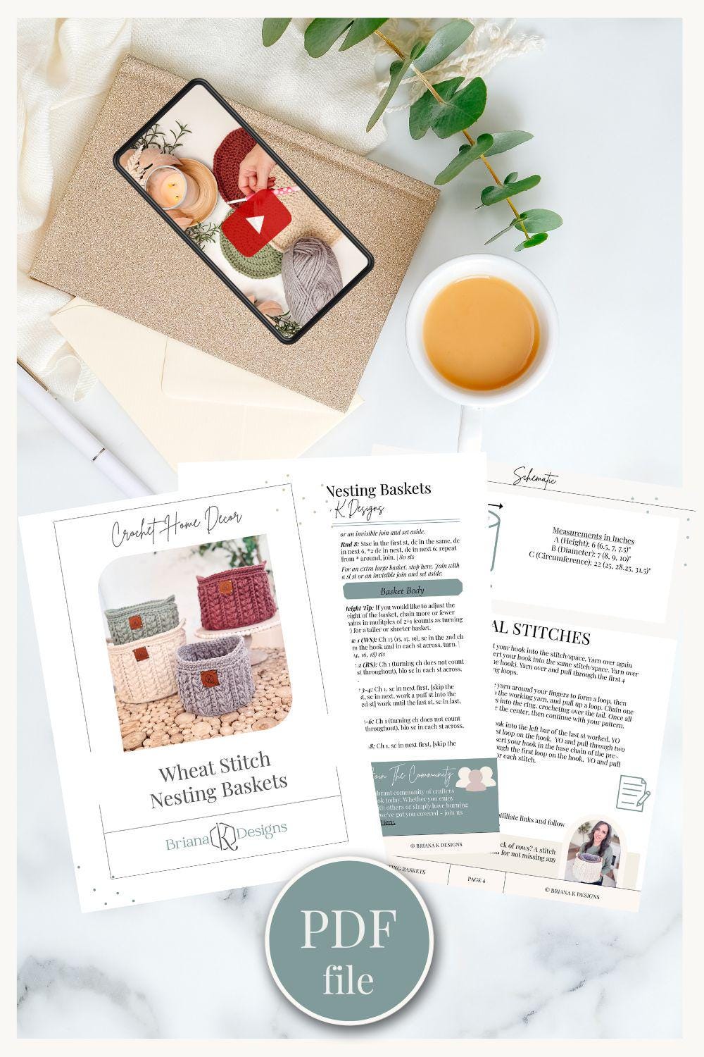 Craft and decor kit with instructions for crocheting wheat stitch nesting baskets, perfect as a handmade gift. Enjoy a cup of coffee while watching a video on your phone, surrounded by vintage charm and greenery on a white surface.