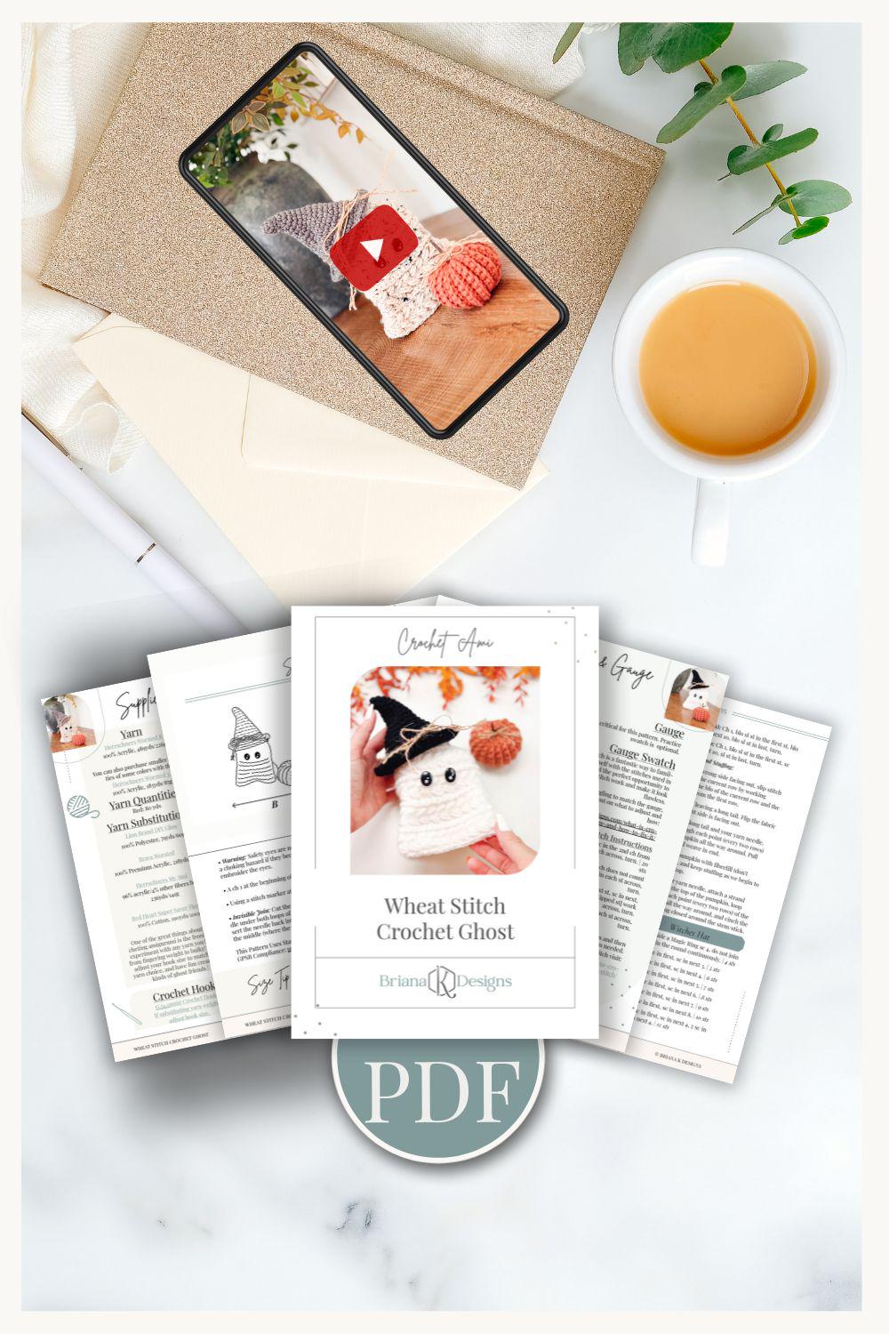 Flat lay of a crochet ghost pattern PDF, printed instructions, a cup of coffee, a plant, a phone with a crochet ghost photo, and an envelope—perfect inspiration for your next handmade gift.