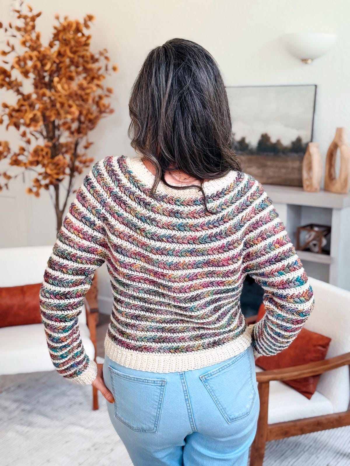Close-up of textured Wheat Stitch Crochet Sweater with ribbed cuffs and neckline; pattern includes 9 size options and guided sleeve shaping for a modern, seamless crochet finish.