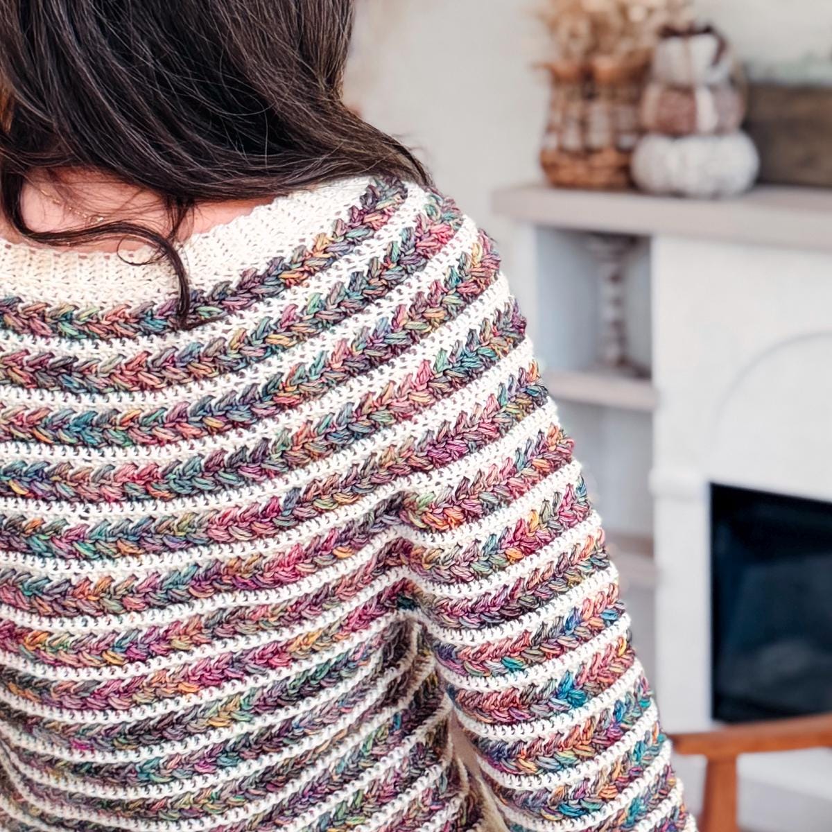 Bright handmade Wheat Stitch Crochet Sweater shown on smiling model; includes 9 sizes, seamless top-down design, and guided sleeve shaping — a cozy, modern crochet project.