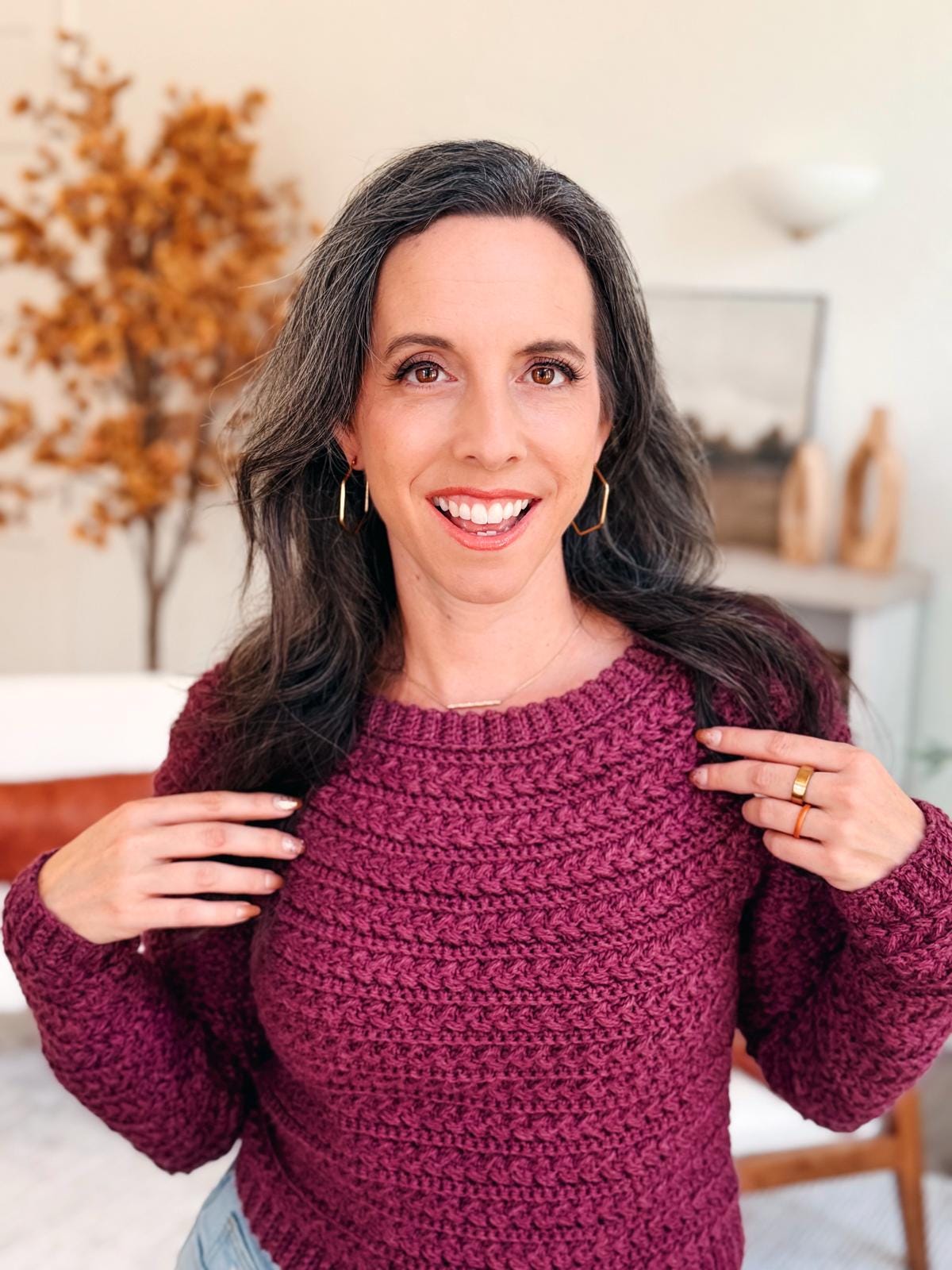 Close-up of textured Wheat Stitch Crochet Sweater with ribbed cuffs and neckline; pattern includes 9 size options and guided sleeve shaping for a modern, seamless crochet finish.