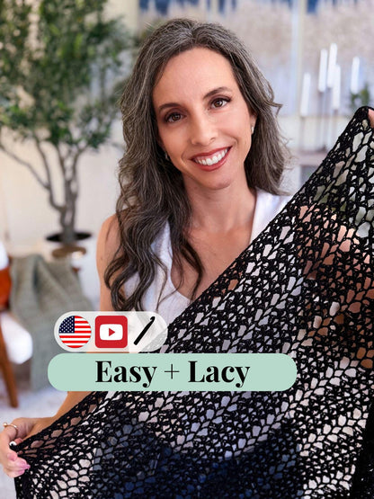 Black mesh crochet wrap held up by a smiling woman indoors, with Easy + Lacy text and flag and video icons