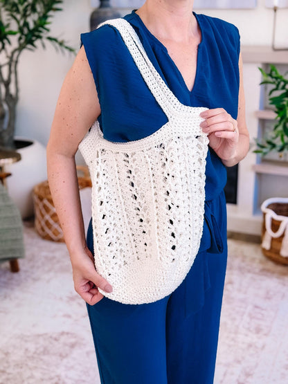 Cream Willow Mesh crochet market bag worn on the shoulder