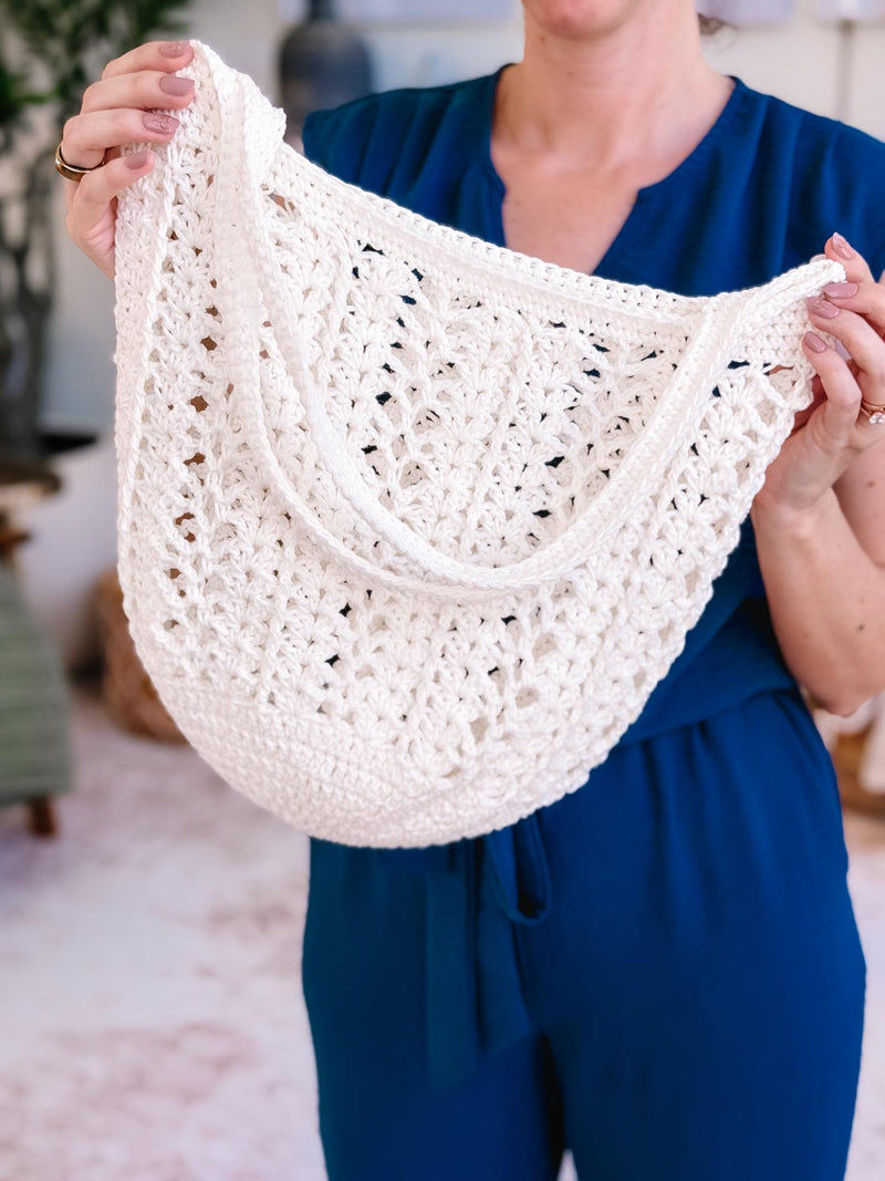 Cream Willow Mesh crochet tote held open to show the airy stitch