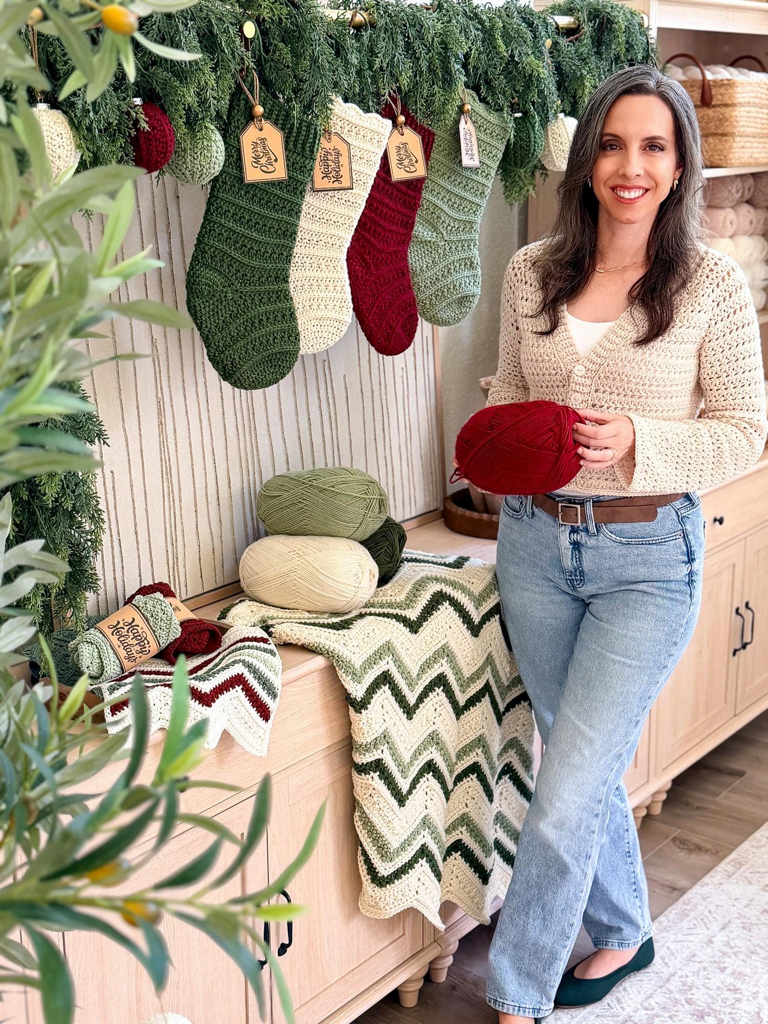 crochet Christmas stocking in Petal Loop Stitch on wood mantel