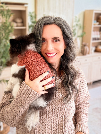 Briana and her dog in matching Wheat Stitch crochet sweaters